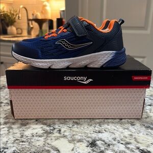 Saucony Blue and Orange Velcro Sneakers. New in box/never worn!